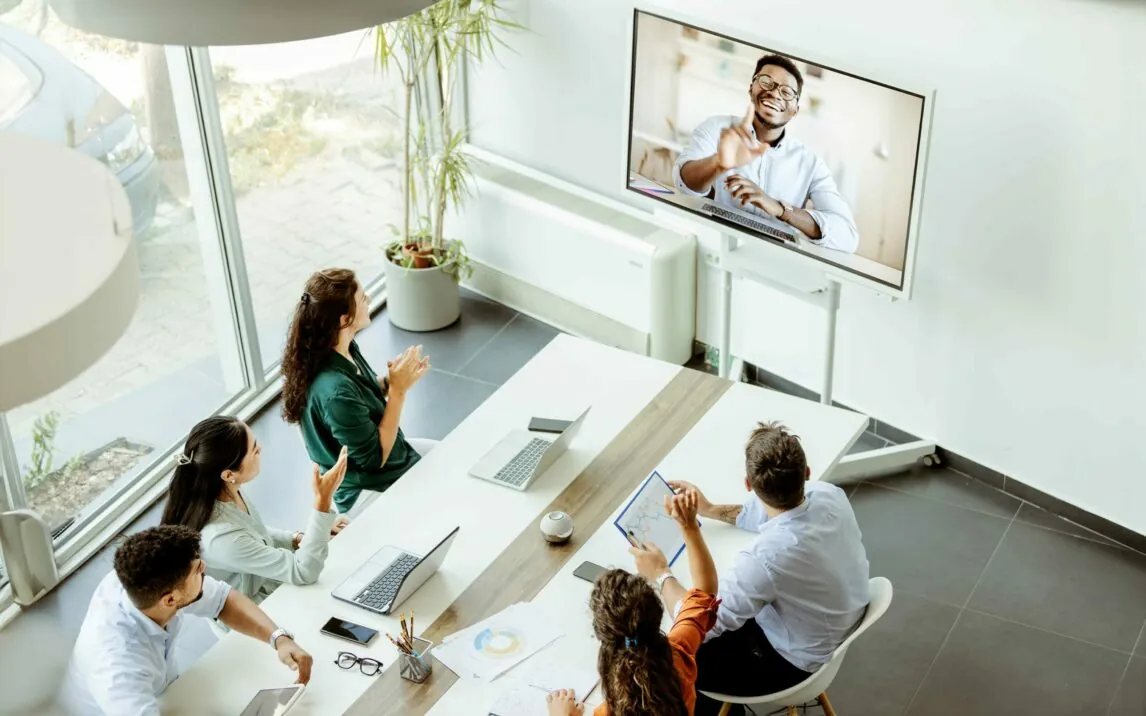 video-conference-meeting-in-office-1393812289 Online video conference webinar meeting in the modern office
