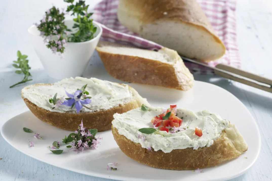 valantic Case Study: Hochland migrates to SAP S/4HANA Image of baguette slices with cream cheese, valantic Case Study Hochland migrates to SAP S/4HANA