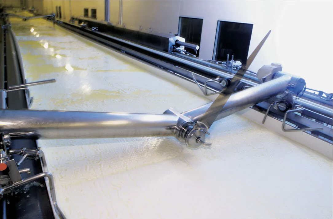 valantic Case Study: Hochland migrates to SAP S/4HANA Picture of feta production at Hochland, valantic Case Study Hochland migrates to SAP S/4HANA